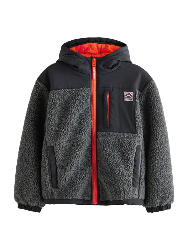 Superdry & Co Superdry & Co Jopa iz flisa  oranžna / črna / pegasto črna