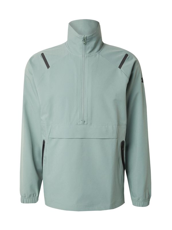 UNDER ARMOUR UNDER ARMOUR Športna majica 'Unstoppable'  pastelno zelena / črna