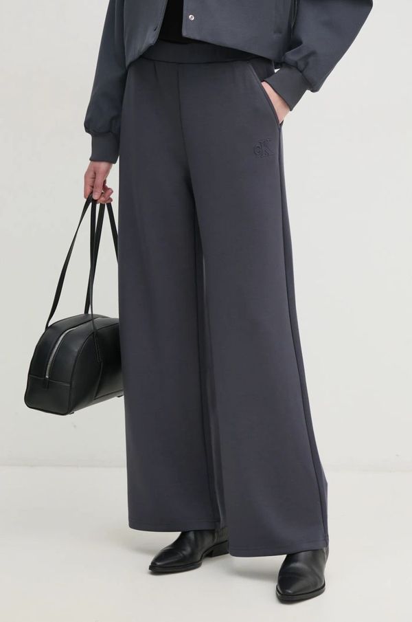 Calvin Klein Jeans Hlače Calvin Klein Jeans ženske, siva barva, J20J225087