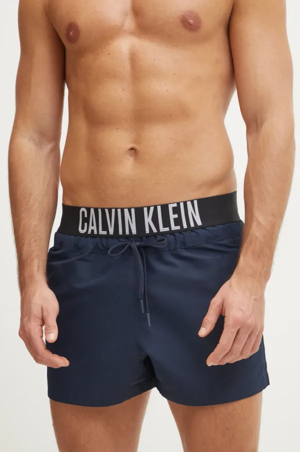 Calvin Klein Kopalne kratke hlače Calvin Klein mornarsko modra barva, KM0KM01094
