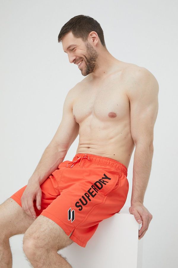 Superdry Kratke hlače za kopanje Superdry oranžna barva