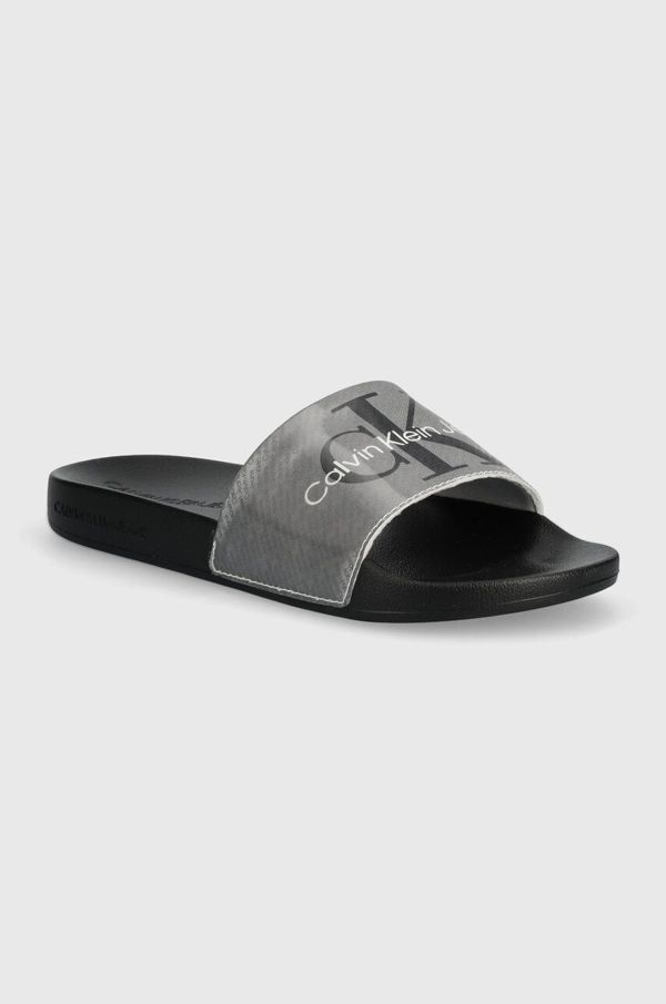 Calvin Klein Jeans Natikači Calvin Klein Jeans SLIDE LENTICULAR ML WN ženski, črna barva, YW0YW01403