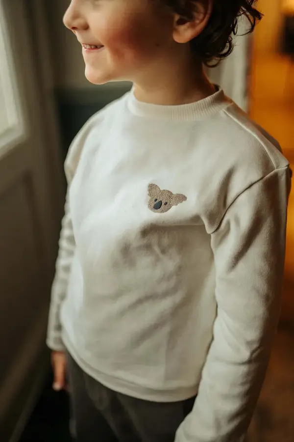 Donsje Otroška bombažna majica z dolgimi rokavi Donsje Jorijn Longsleeve Koala