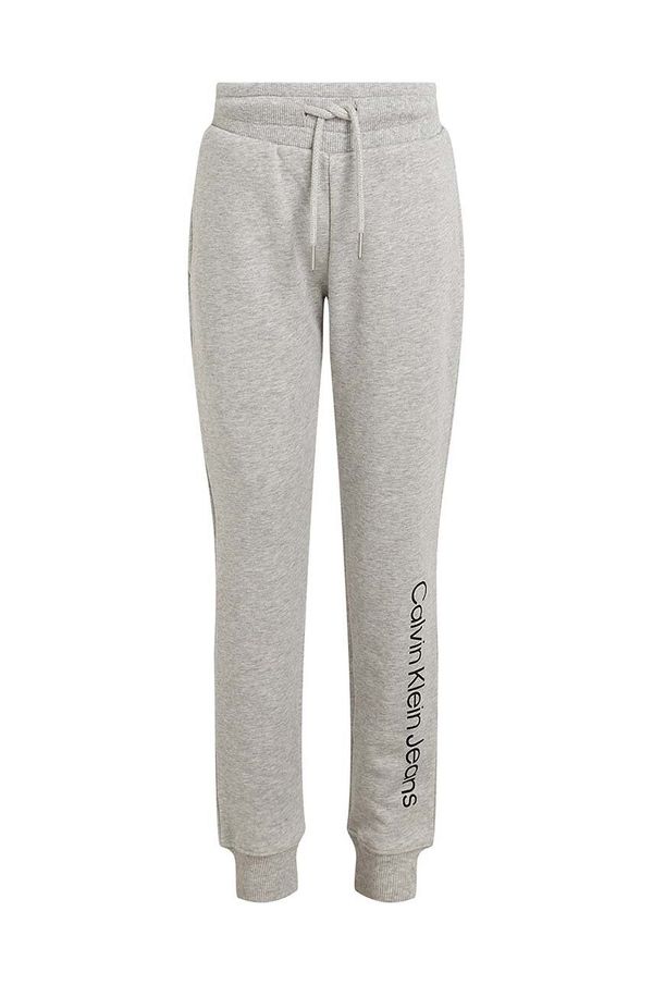 Calvin Klein Jeans Otroška bombažna trenirka Calvin Klein Jeans REGULAR JOGGER siva barva, IU0IU00604