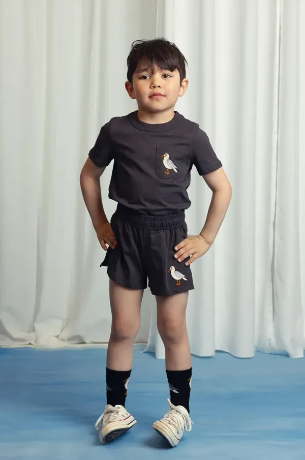 Mini Rodini Otroške bombažne kratke hlače Mini Rodini Seagull črna barva, 2523012799
