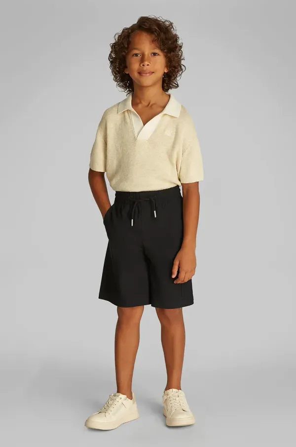 Calvin Klein Jeans Otroške kratke hlače Calvin Klein Jeans črna barva, IB0IB02512