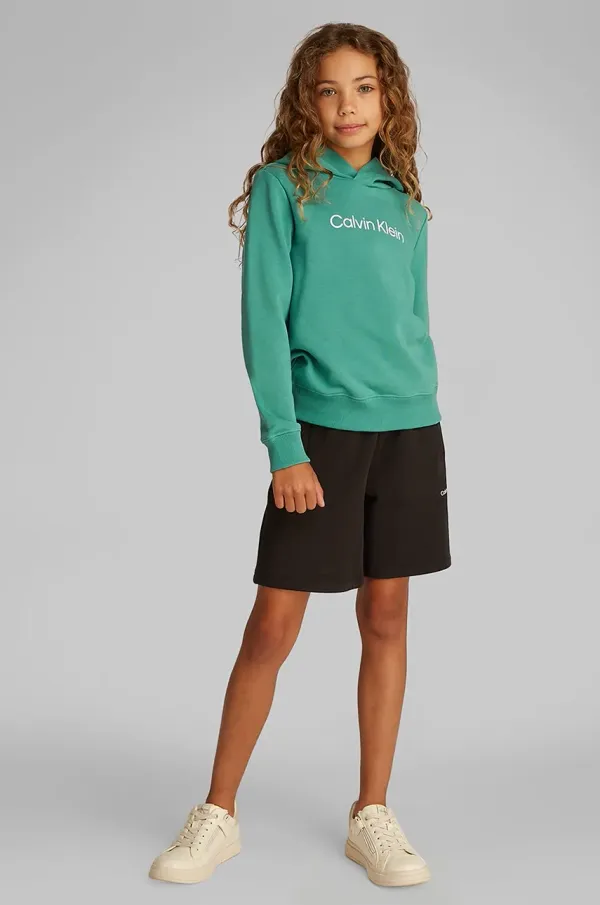 Calvin Klein Jeans Otroški bombažen pulover Calvin Klein Jeans zelena barva, s kapuco, IU0IU00679