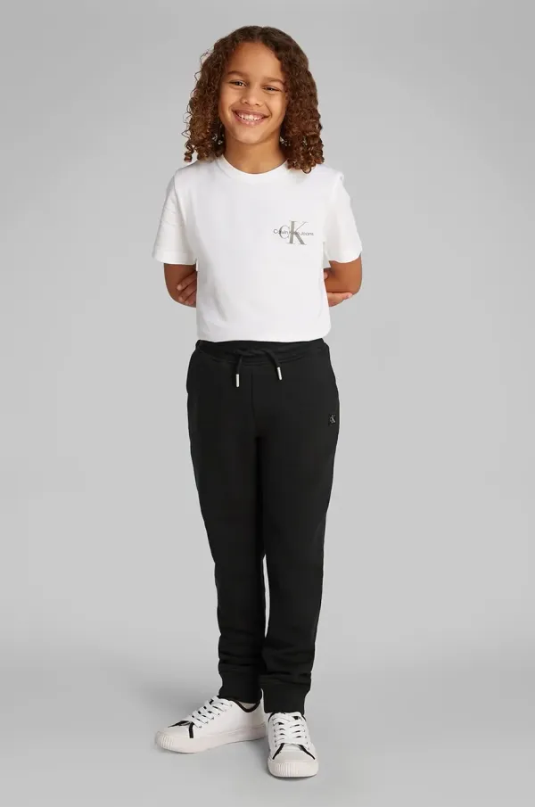 Calvin Klein Jeans Otroški spodnji del trenirke Calvin Klein Jeans črna barva, IU0IU00621