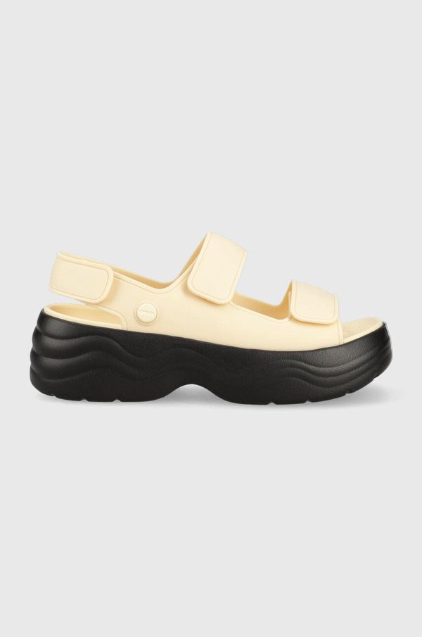 Crocs Sandali Crocs Skyline Slide ženski, bež barva, 208183