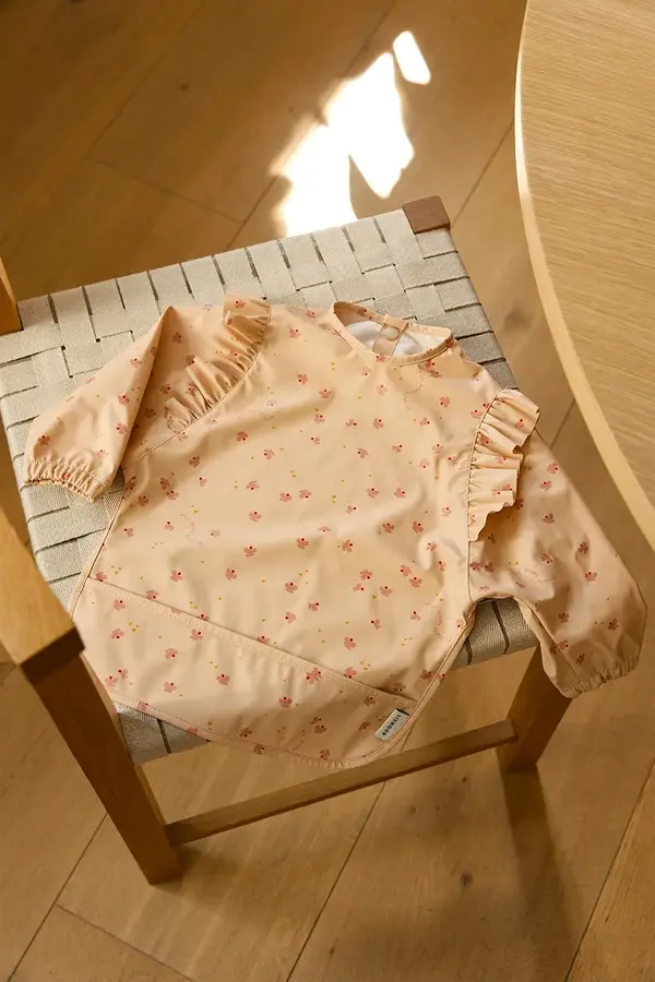Liewood Slinček za dojenčka Liewood Merle Ruffle Cape Bib