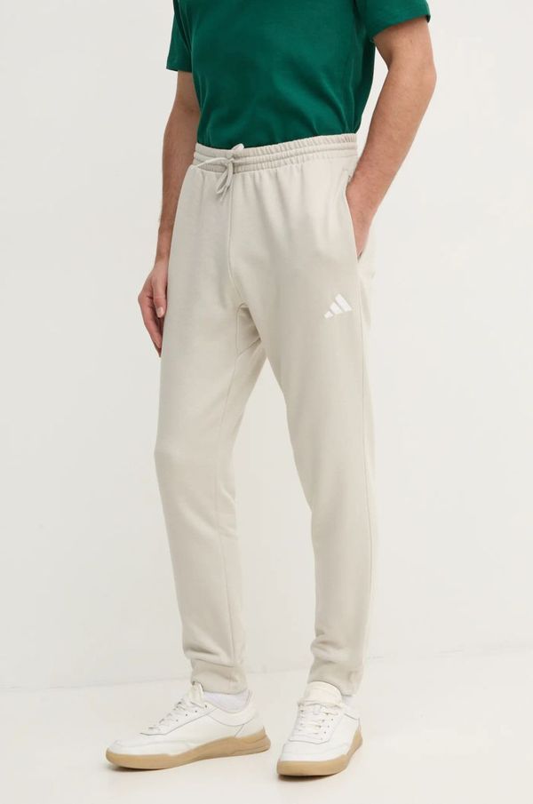 adidas Spodnji del trenirke adidas Feelcozy bež barva, IN6078