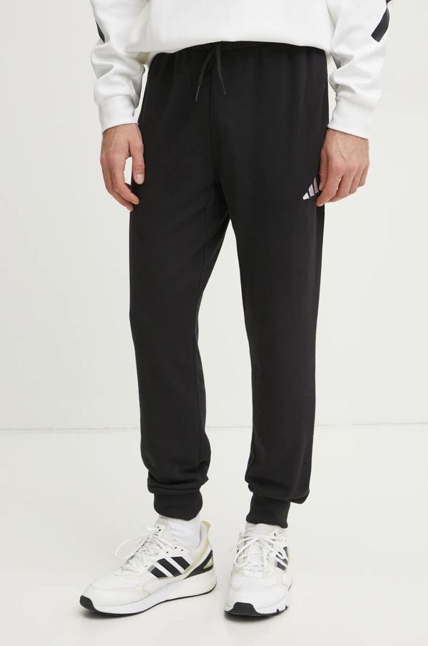 adidas Spodnji del trenirke adidas Feelcozy črna barva, JE3854