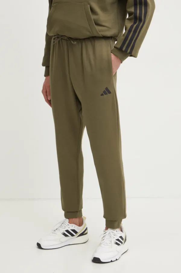 adidas Spodnji del trenirke adidas Feelcozy zelena barva, JE3812