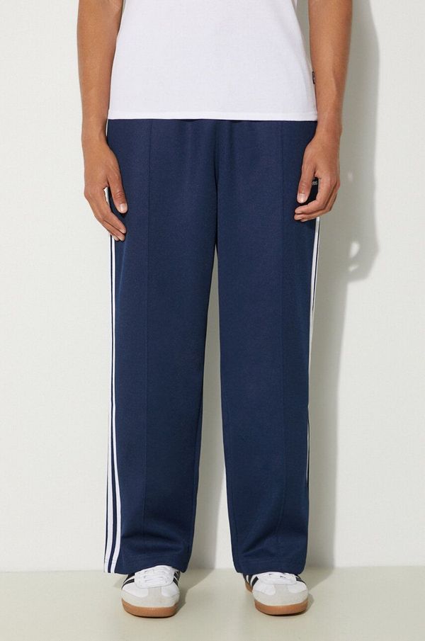 adidas Originals Spodnji del trenirke adidas Originals Adicolor Baggy Fit Firebird Pant mornarsko modra barva, IZ2466