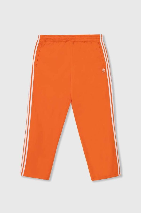 adidas Originals Spodnji del trenirke adidas Originals oranžna barva, IR9894