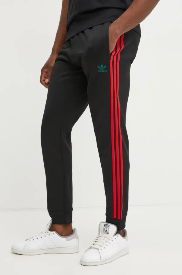 adidas Originals Spodnji del trenirke adidas Originals SST TP črna barva, JP1225