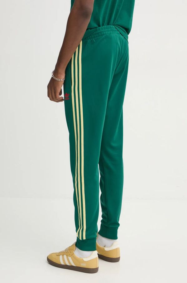 adidas Originals Spodnji del trenirke adidas Originals SST TP zelena barva, JP1224