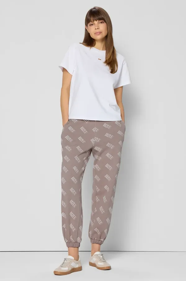 BIZUU Spodnji del trenirke Bizuu MERING oranžna barva, MERING BEŻOWY KW25