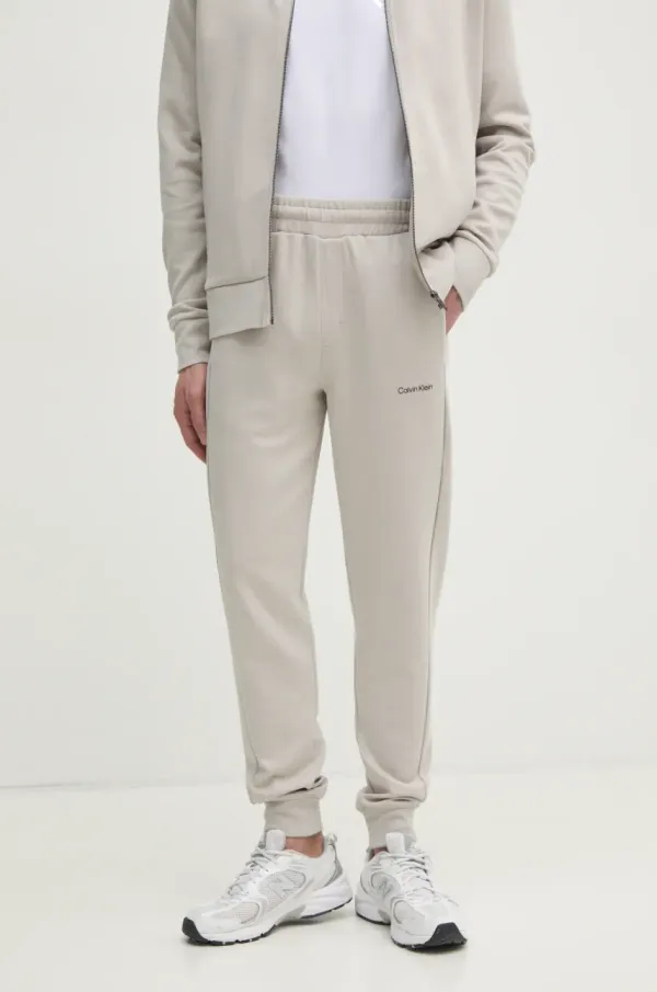 Calvin Klein Spodnji del trenirke Calvin Klein bež barva