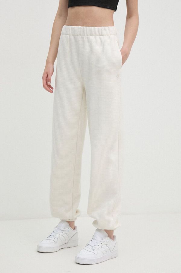 Calvin Klein Jeans Spodnji del trenirke Calvin Klein Jeans bež barva, J20J223920