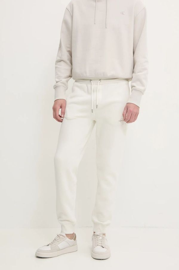 Calvin Klein Jeans Spodnji del trenirke Calvin Klein Jeans bež barva, J30J325658