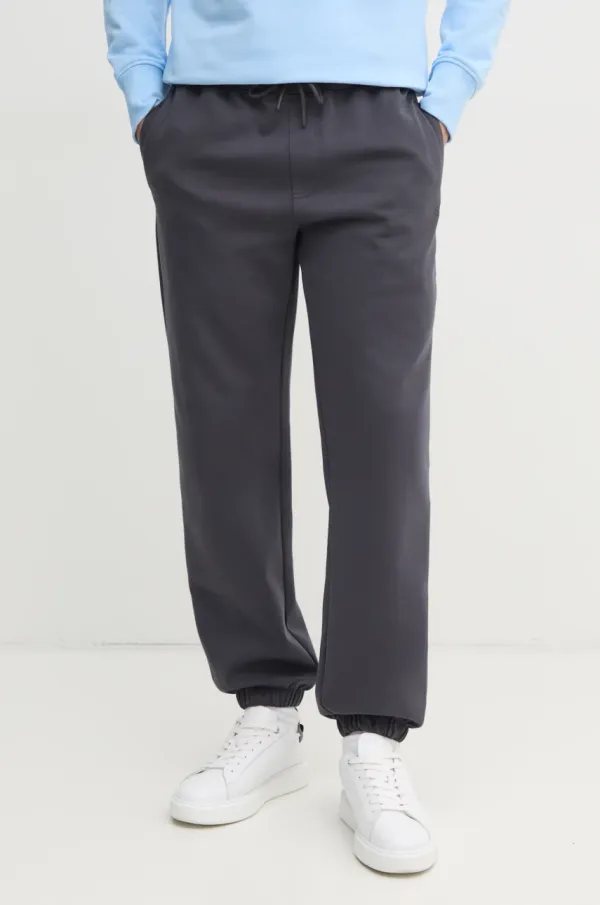 Calvin Klein Jeans Spodnji del trenirke Calvin Klein Jeans siva barva, J30J327241