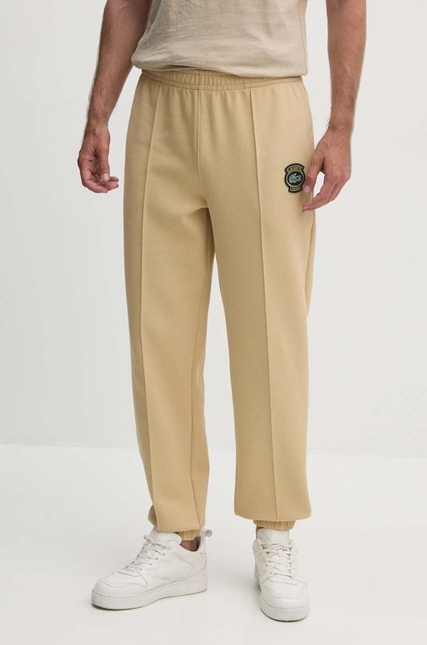 Lacoste Spodnji del trenirke Lacoste bež barva