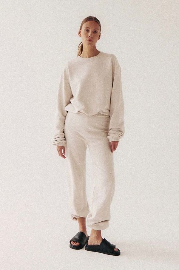 Muuv. Spodnji del trenirke MUUV. bež barva