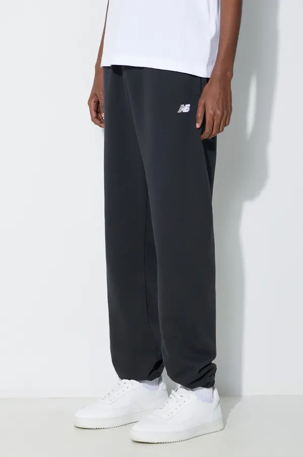 New Balance Spodnji del trenirke New Balance Essentials French Terry Jogger