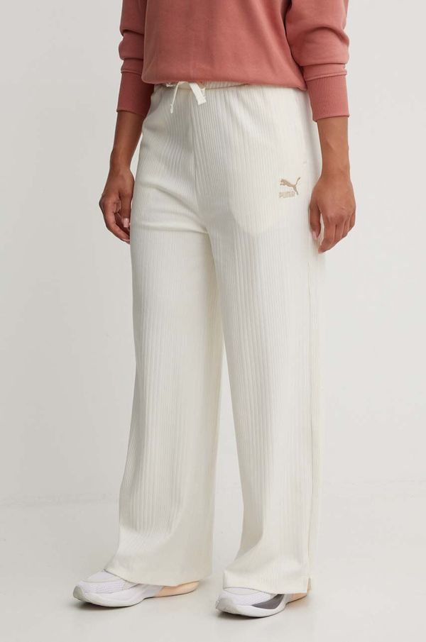 Puma Spodnji del trenirke Puma bež barva