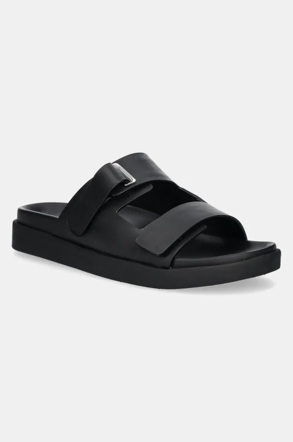Calvin Klein Usnjeni natikači Calvin Klein FLAT ADJ SLIDE EYELET ženski, črna barva, HW0HW02489
