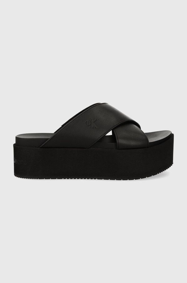 Calvin Klein Jeans Usnjeni natikači Calvin Klein Jeans FLATFORM CROSS MG UC ženski, črna barva