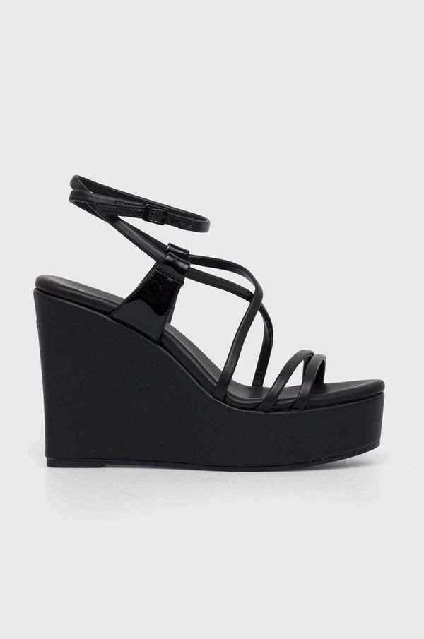 Calvin Klein Usnjeni sandali Calvin Klein WEDGE črna barva, HW0HW01952