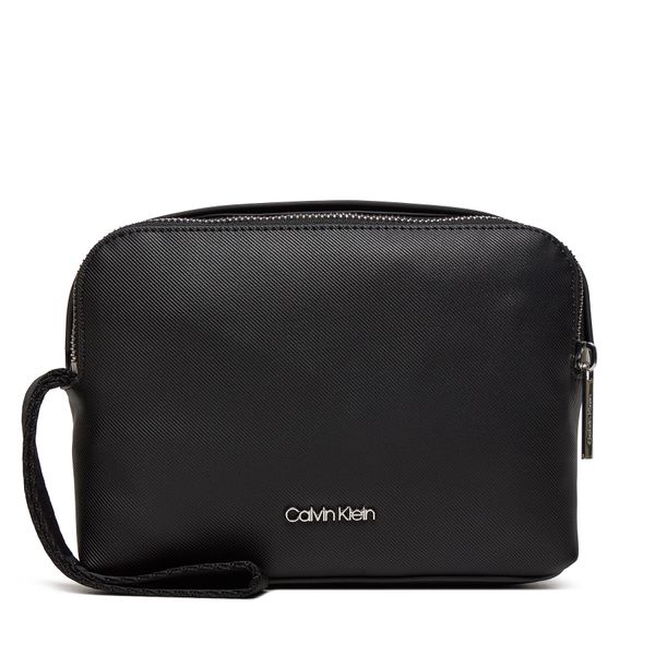 Calvin Klein Torbica za okrog pasu Calvin Klein Ck Est. Pu Compact Case K50K512109 Črna