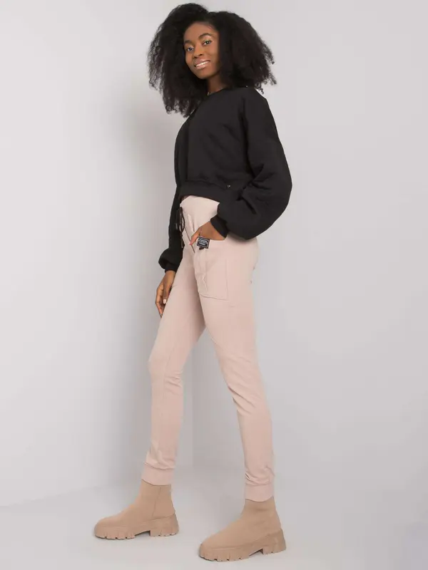 RELEVANCE Bež trenirke z žepi