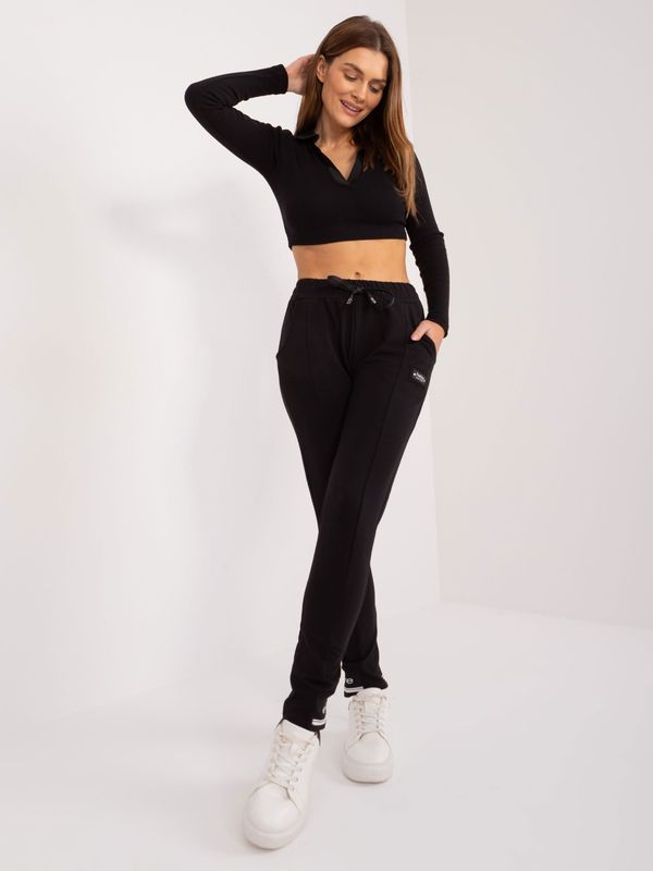 Fashionhunters Black sweatpants with decorative cuffs