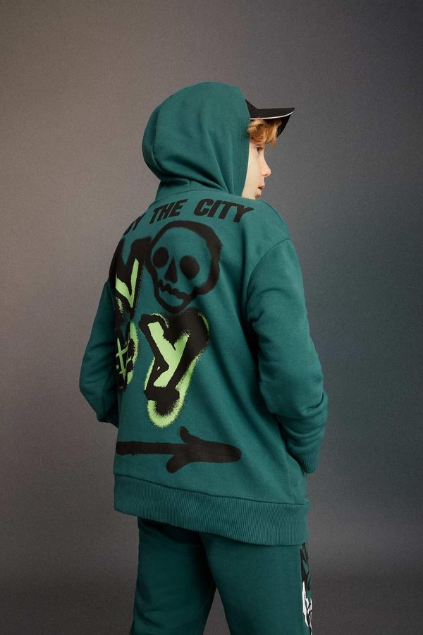 DEFACTO DEFACTO Boy&#39;s Oversize Fit Back Printed Hooded Sweatshirt