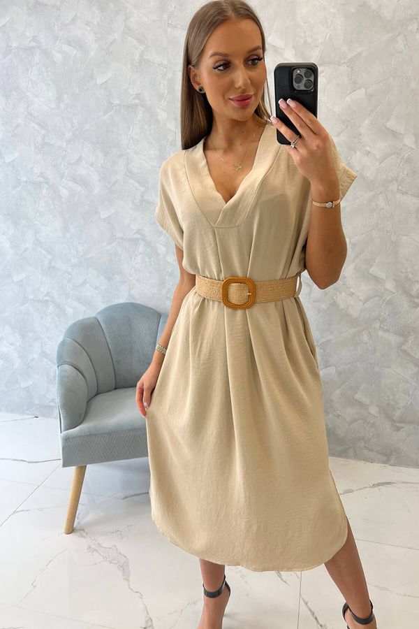 Kesi Dress with decorative belt in beige color