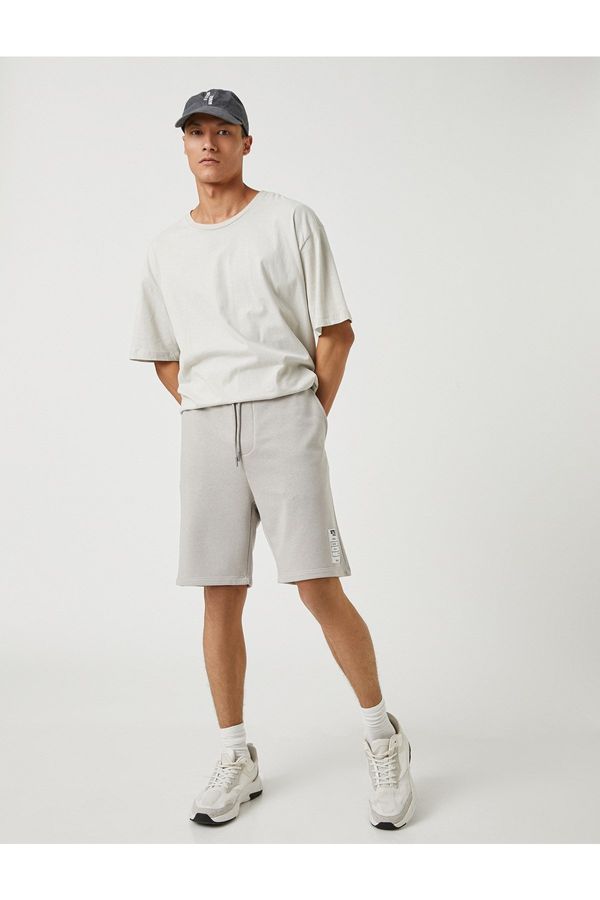 Koton Koton Basic Shorts Tie the waist, Slogan and Printed Labels, Pockets.