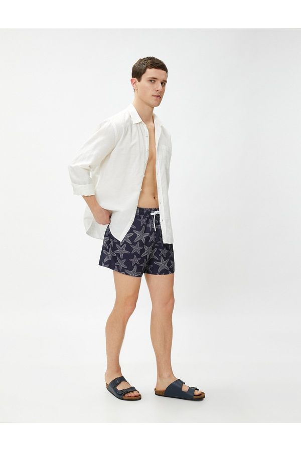 Koton Koton Marine Shorts with a Star Print Tie Waist, Pocket Detailed.