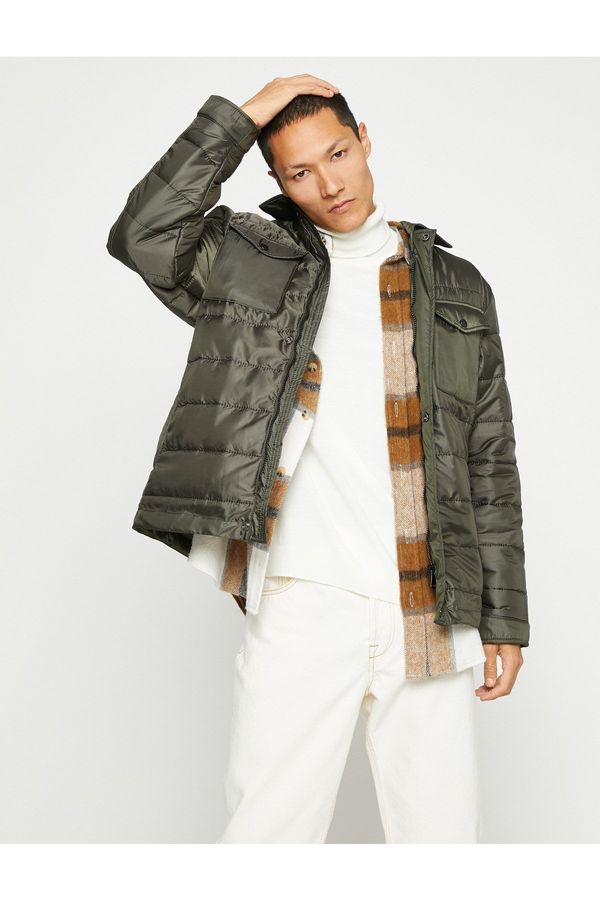Koton Koton Shiny napihljiva jakna z žepom za srajčne ovratnike, podrobna in zaskočna gumba vodoodporna.