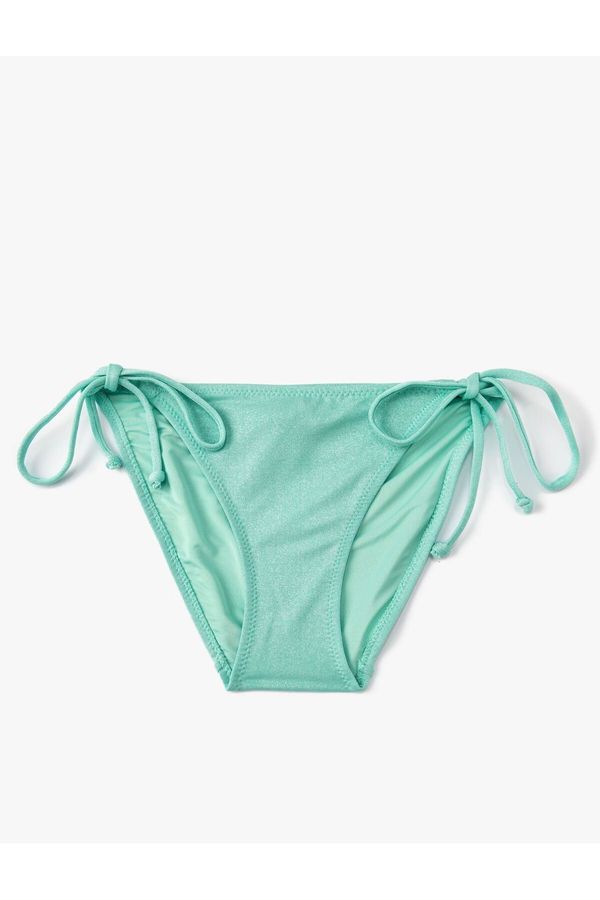 Koton Koton Textured Bikini Bottoms Normal Waist Tie Detail on the sides.