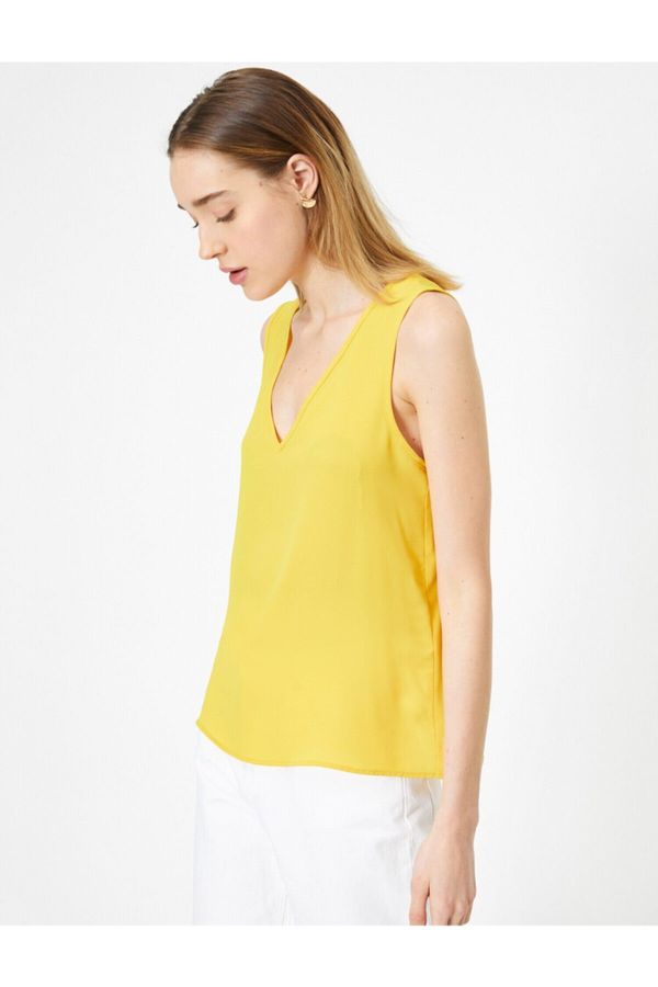 Koton Koton Women's Yellow V-Neck Basic blouse with a loose fit