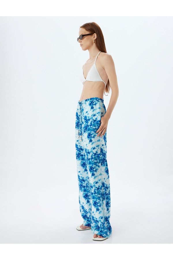 Koton Koton X Şahika Ercümen - Viscose Trousers with Batik Pattern and Wide Leg