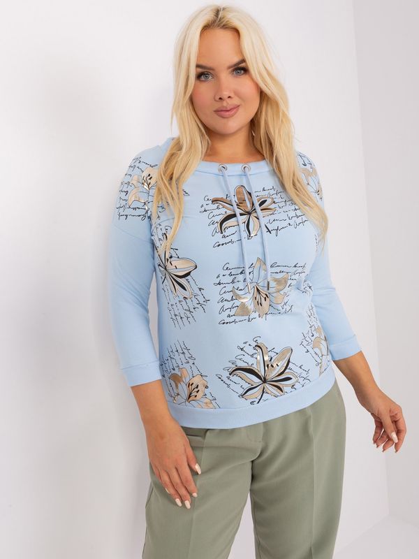 Fashionhunters Light blue women's plus size blouse with print