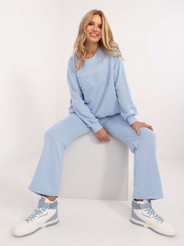 Fashionhunters Light blue women's tracksuit with inscription