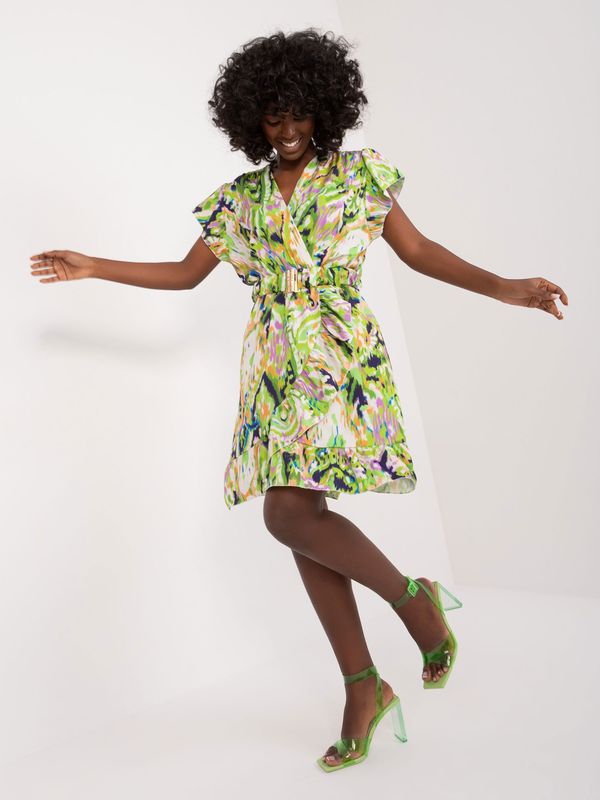 Fashionhunters Light green dress with prints and ruffles