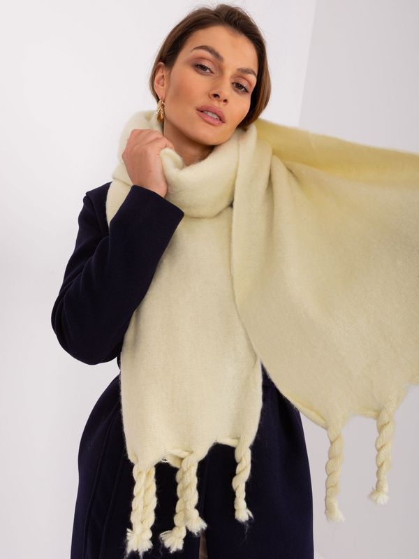 Fashionhunters Light yellow smooth scarf with fringe