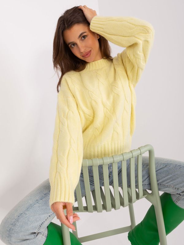 Fashionhunters Light yellow sweater with cables and cuffs