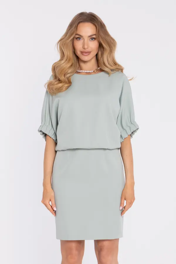 Made Of Emotion Made Of Emotion Woman's Mini dress with a loose top and a back slit - mint green